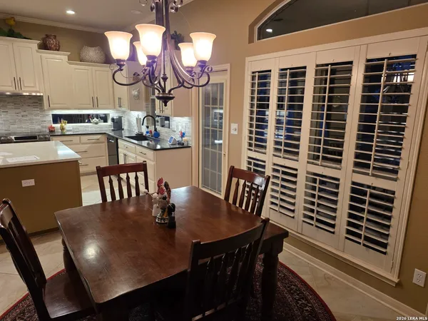 a large kitchen with cabinets