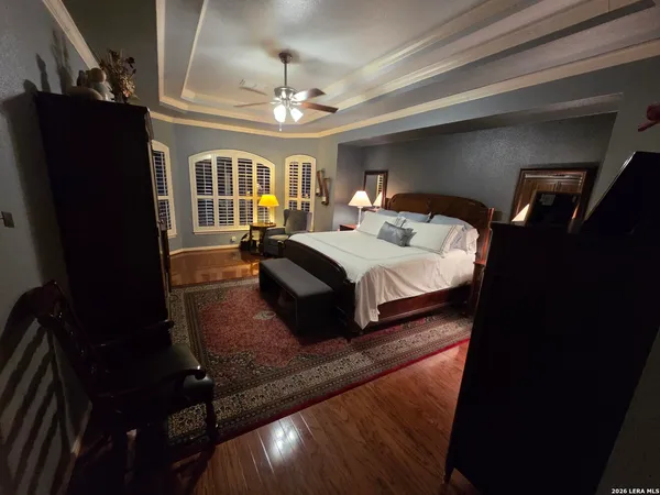 a bathroom with a double vanity sink and mirror