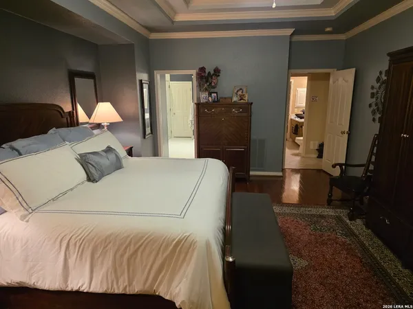 a bathroom with a bathtub sink mirror and toilet