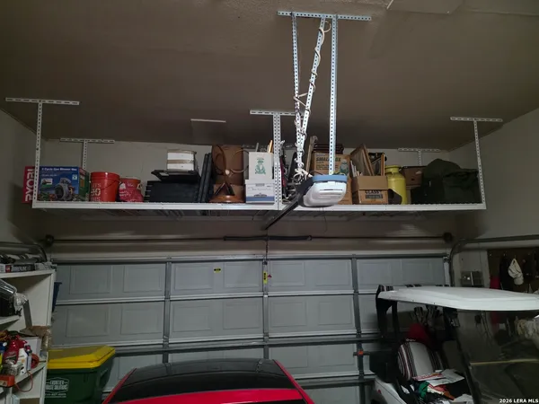 a room with lots of furniture and clutter