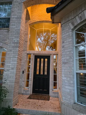 a front view of a building with a glass door