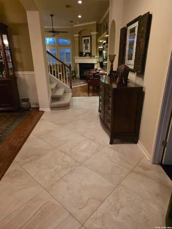 a view of living room with furniture and a flat screen tv