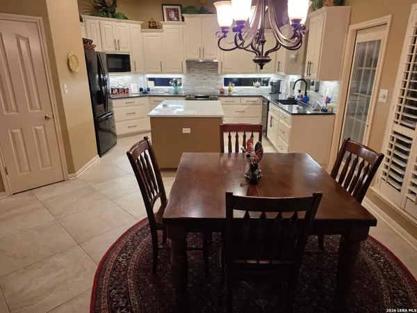 a view of a dining room with furniture
