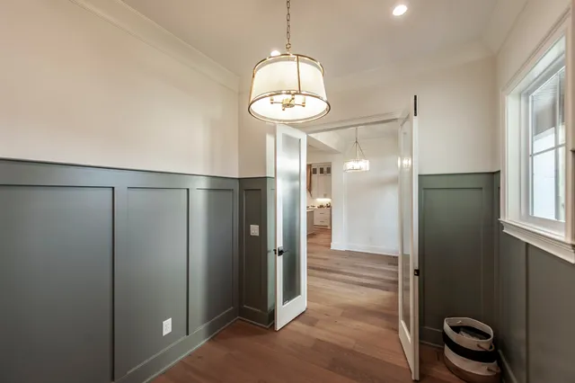 a kitchen with a stove and cabinets