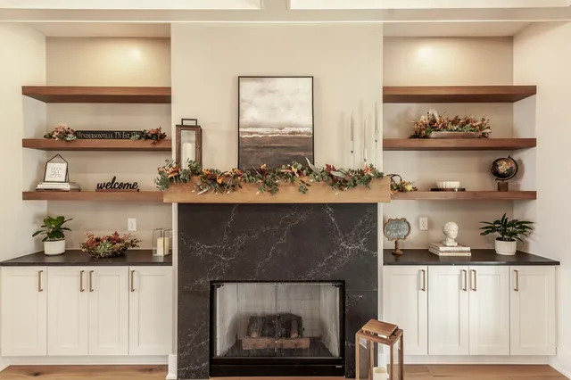 a kitchen with cabinets and stainless steel appliances