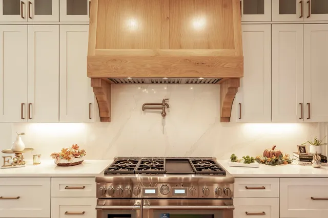 a bathroom with a bathtub and a window