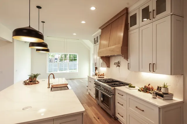 a bathroom with a shower and a glass door