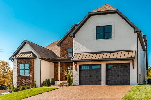 a view of a room with large windows