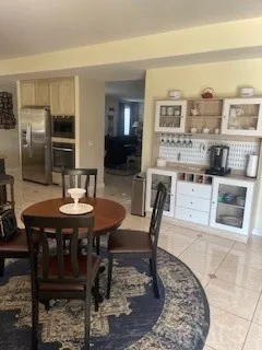 a view of a dining room with furniture