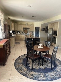 18689 Hawkhill Avenue Perris, CA 92570 - Photo 18 of 52 a view of a dining room with furniture
