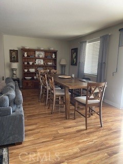 18689 Hawkhill Avenue Perris, CA 92570 - Photo 21 of 52 a view of a dining room with furniture