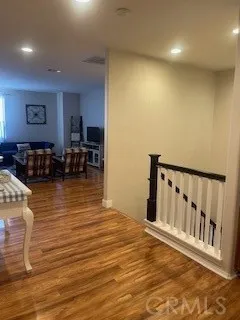 a view of livingroom with furniture and workspace