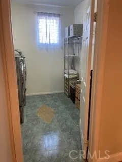 a view of a storage & utility room in a kitchen
