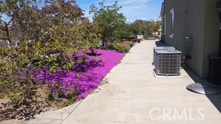 18689 Hawkhill Avenue Perris, CA 92570 - Photo 45 of 52 a view of a yard and pathway