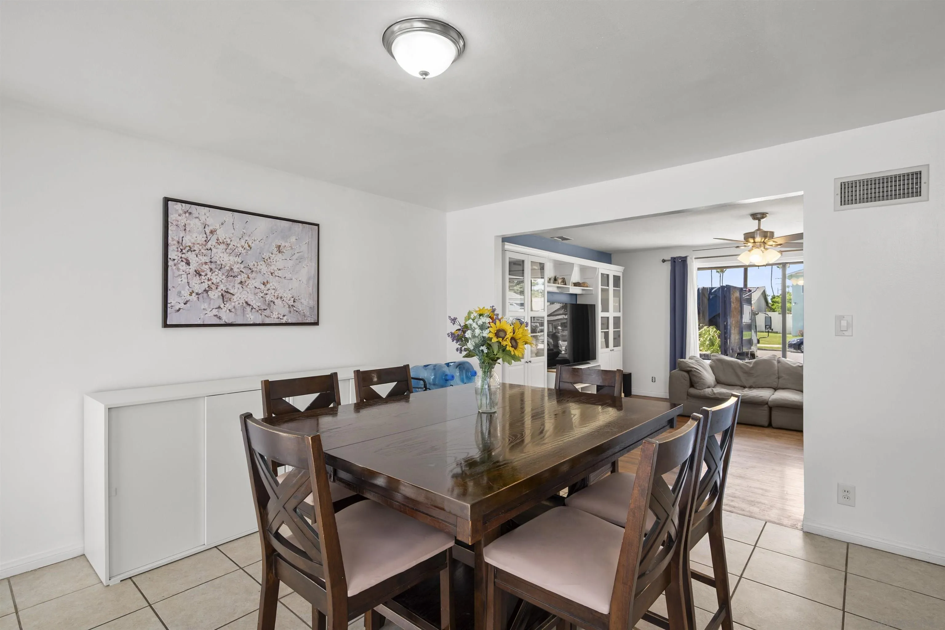 8740 Adriana Street Spring Valley, CA 91977 - Photo 15 of 32 a view of a dining room with furniture