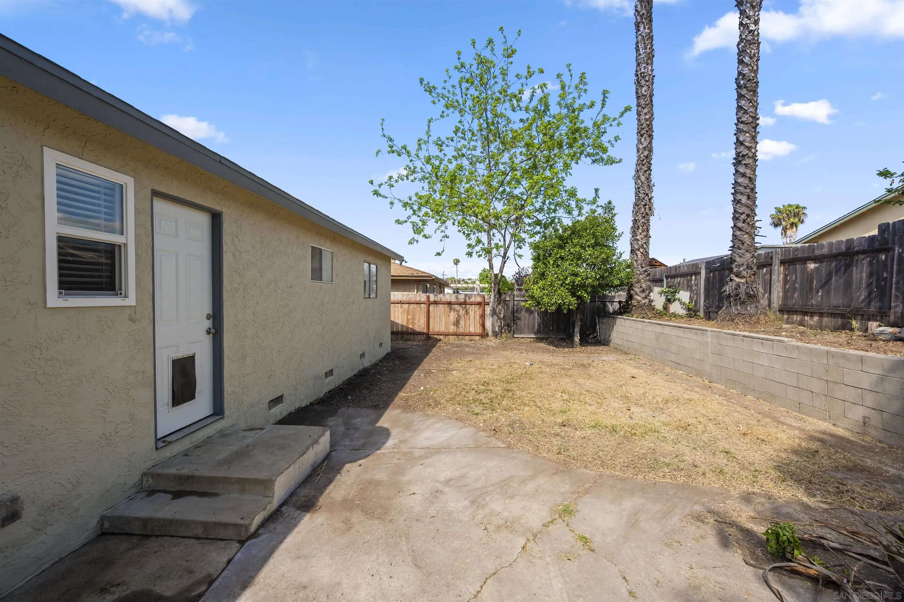 8740 Adriana Street Spring Valley, CA 91977 - Photo 24 of 32 a view of a backyard of the house