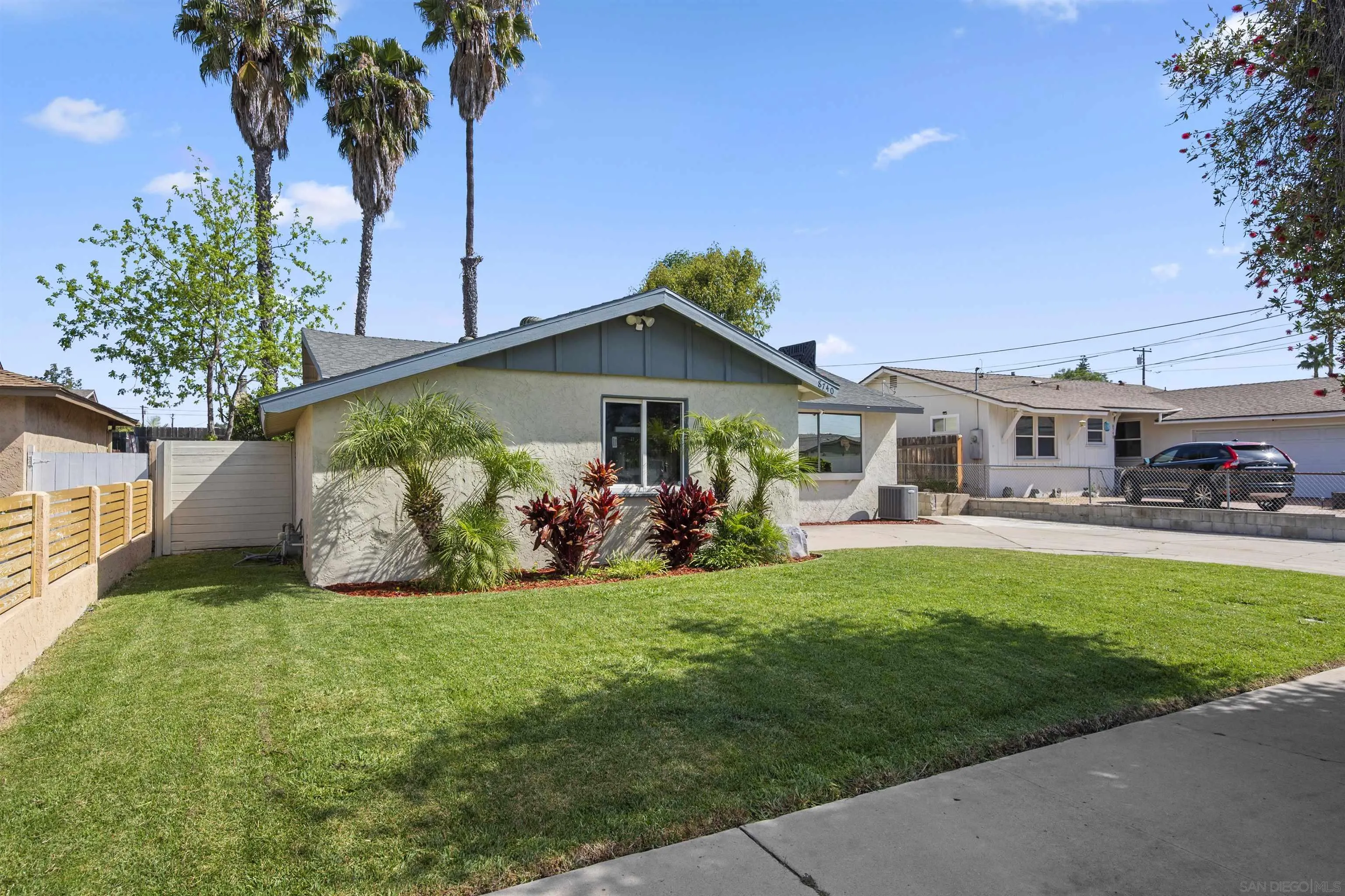 8740 Adriana Street Spring Valley, CA 91977 - Photo 29 of 32 a view of a house with a yard and sitting area