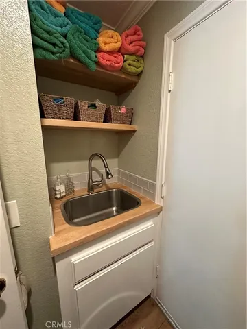 a close view of laundry room with a washer and dryer
