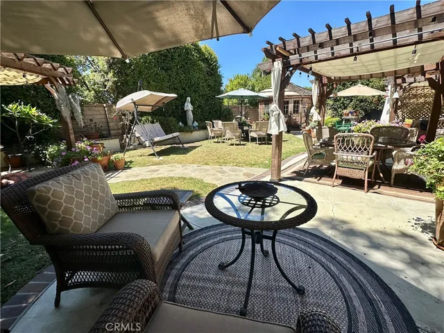 a view of a chairs and tables in patio