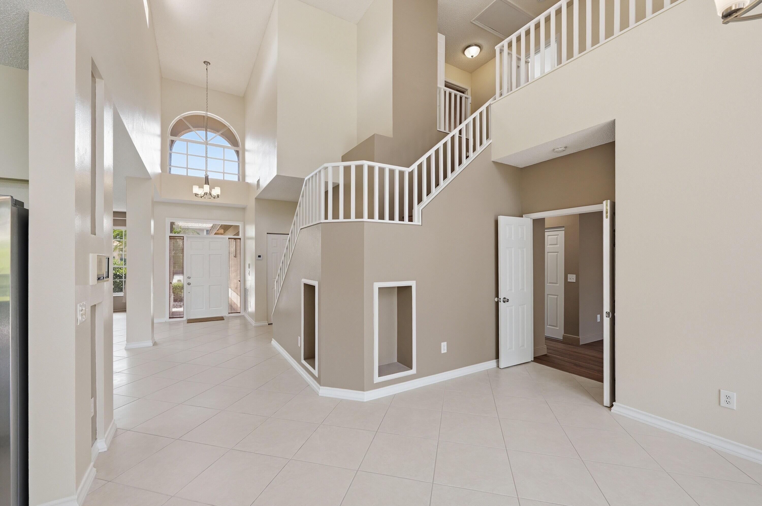 18474 Old Princeton Lane Boca Raton, FL 33498 - Photo 13 of 46 a view of an entryway with wooden floor