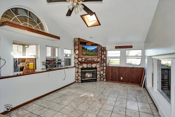 a large living room with a large window