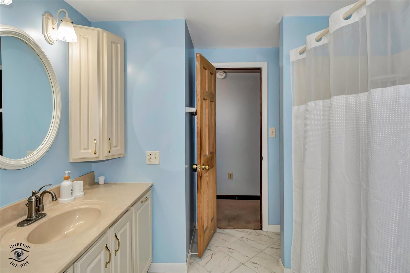 3230 North Glenn Road Bourbonnais, IL 60914 - Photo 19 of 34 a bathroom with a sink a toilet and shower