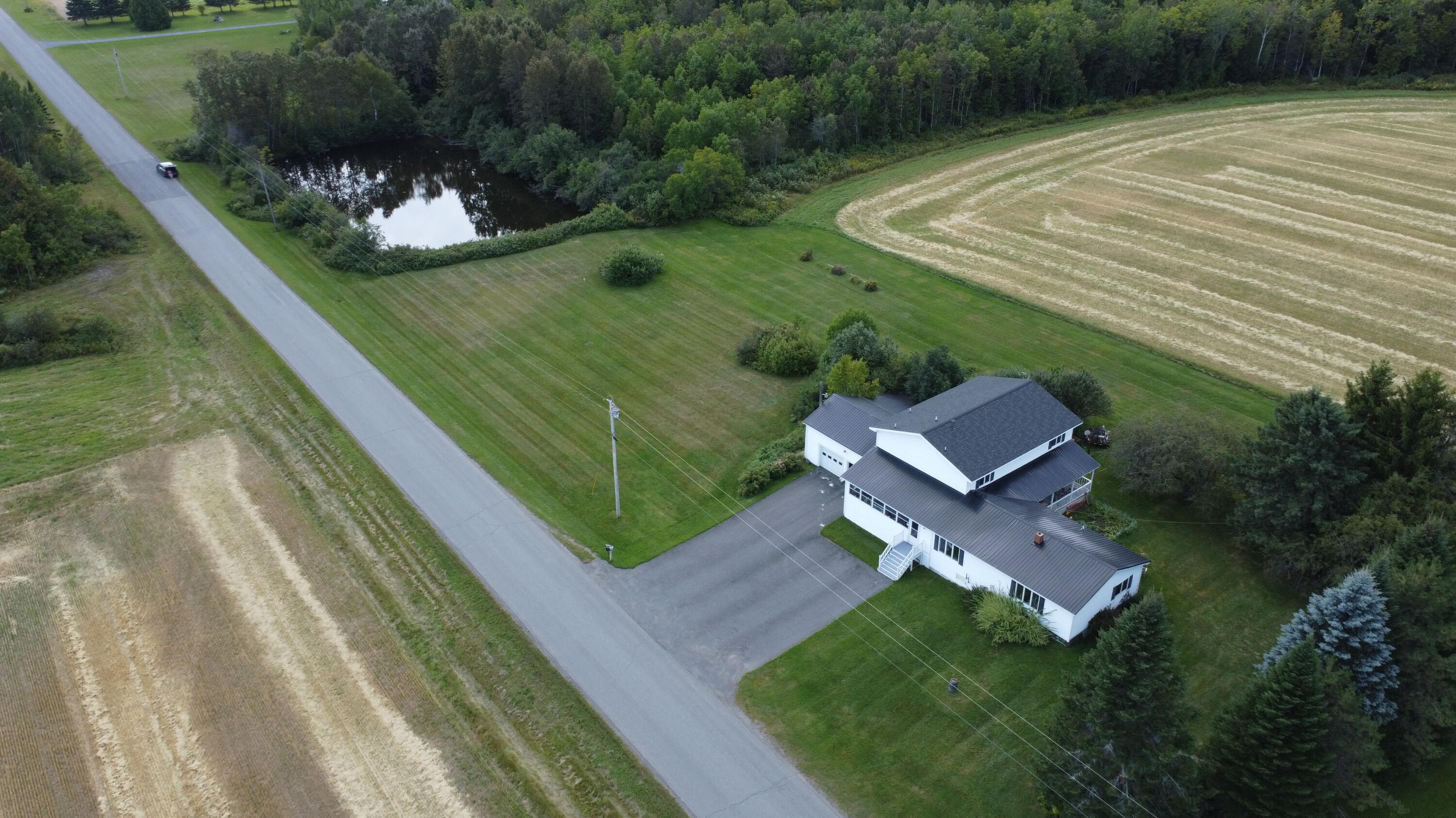 594 Waddell Road Castle Hill, ME 04757 - Photo 2 of 36 dji_fly_20250902_121008_205_175682943178