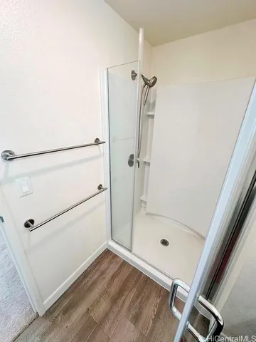 a bathroom with a double vanity sink and mirror