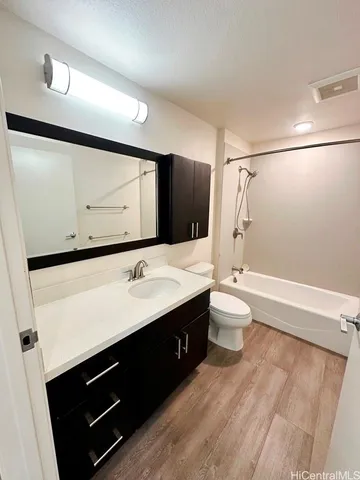 an empty room with large windows