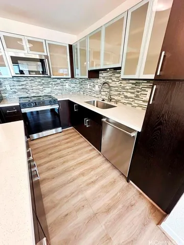 wooden floor with a window in a room