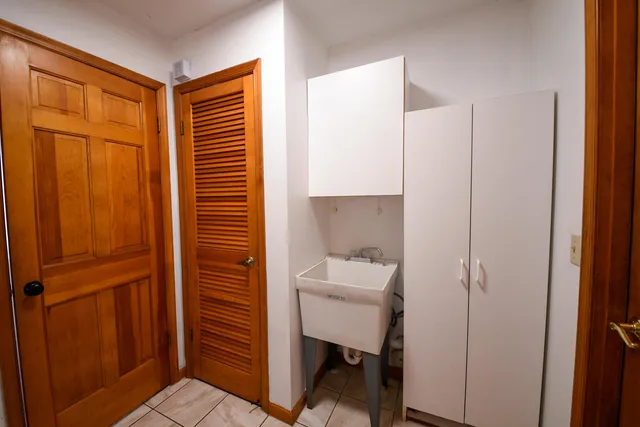 a room with a black white checkered floor