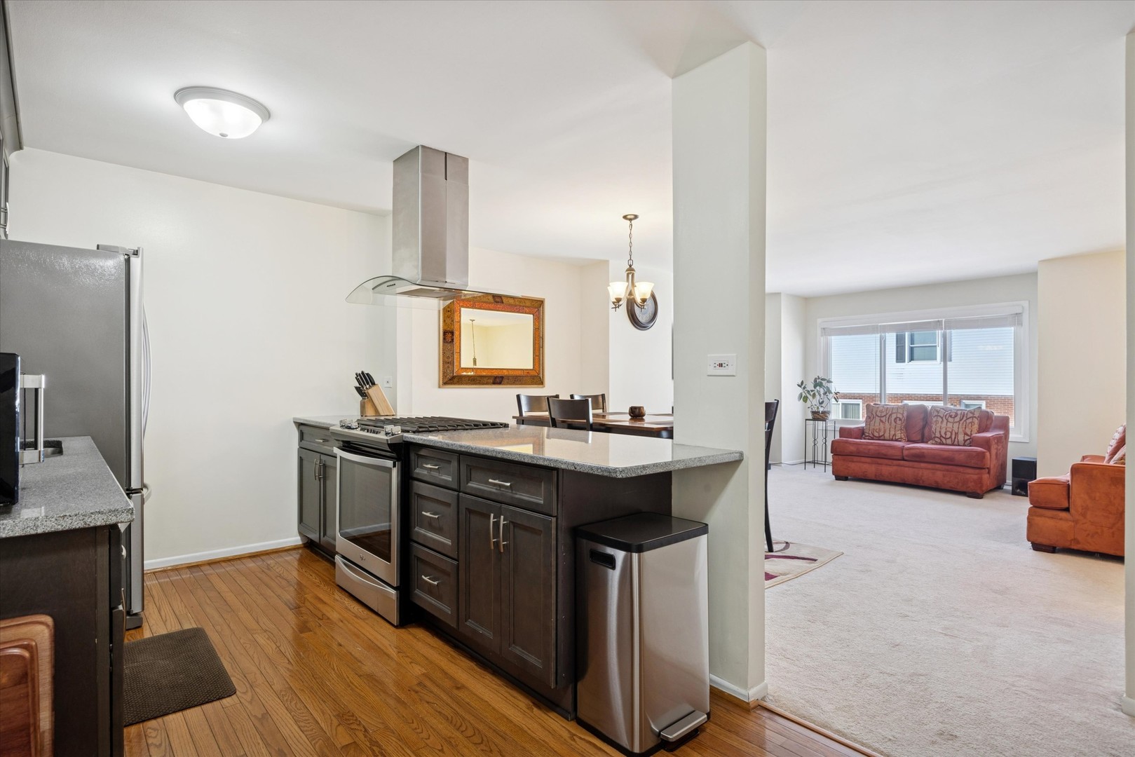 351 Park Ridge Lane, Unit D Aurora, IL 60504 - Photo 3 of 29 a kitchen with sink refrigerator and stove