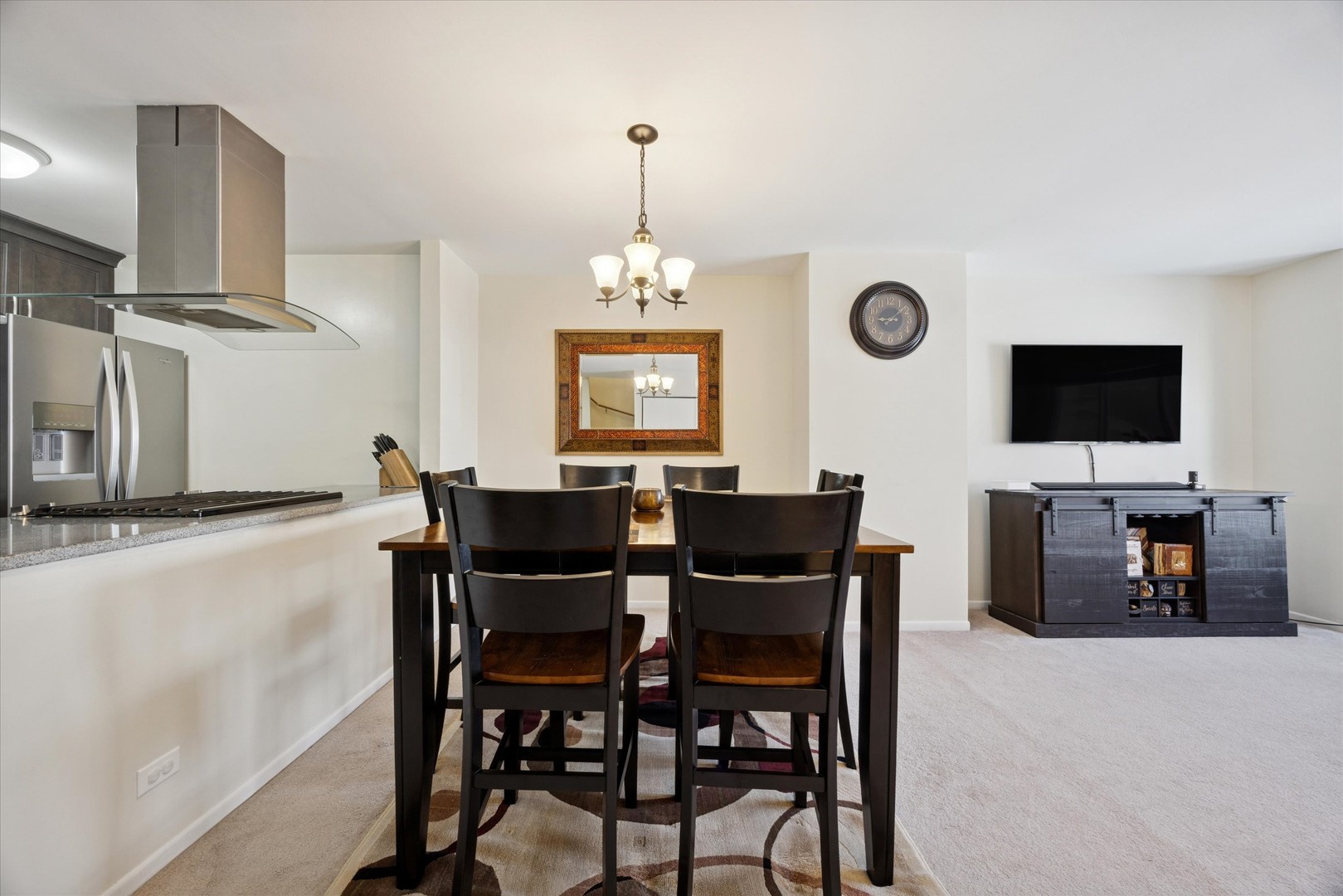 351 Park Ridge Lane, Unit D Aurora, IL 60504 - Photo 5 of 29 a view of a dining room with furniture window and wooden floor