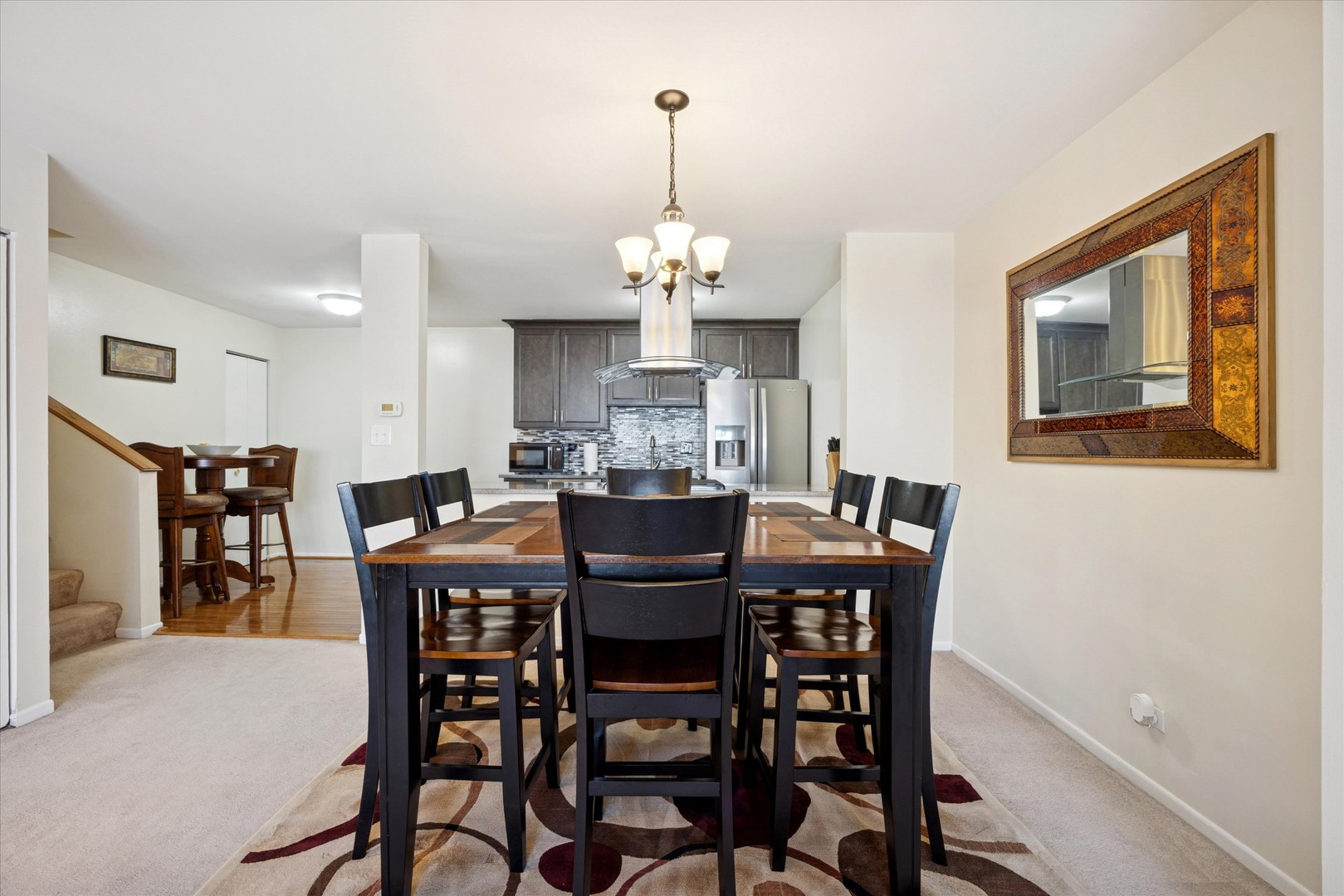 351 Park Ridge Lane, Unit D Aurora, IL 60504 - Photo 6 of 29 a view of a dining room with furniture window and wooden floor