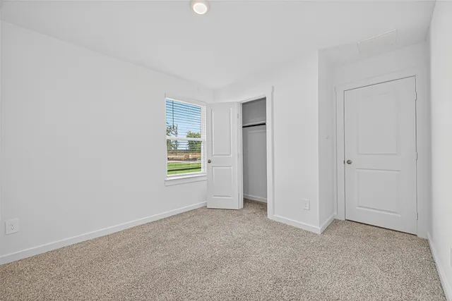 an empty room with a window