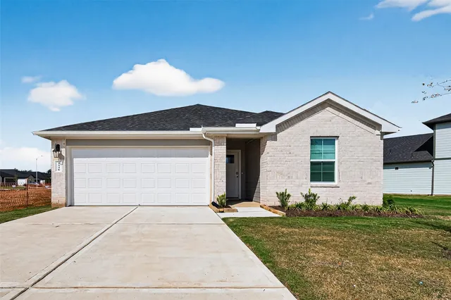 a front view of house with yard