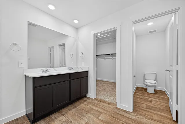 a view of an empty walk in closet