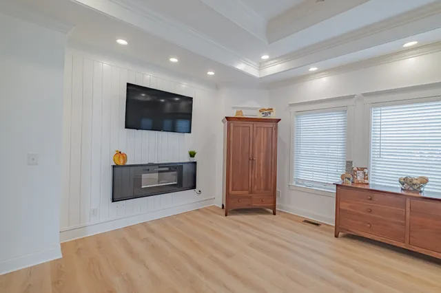 a spacious bathroom with a double vanity sink and a mirror