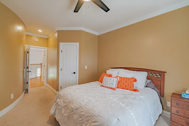 a view of a hallway with seating area