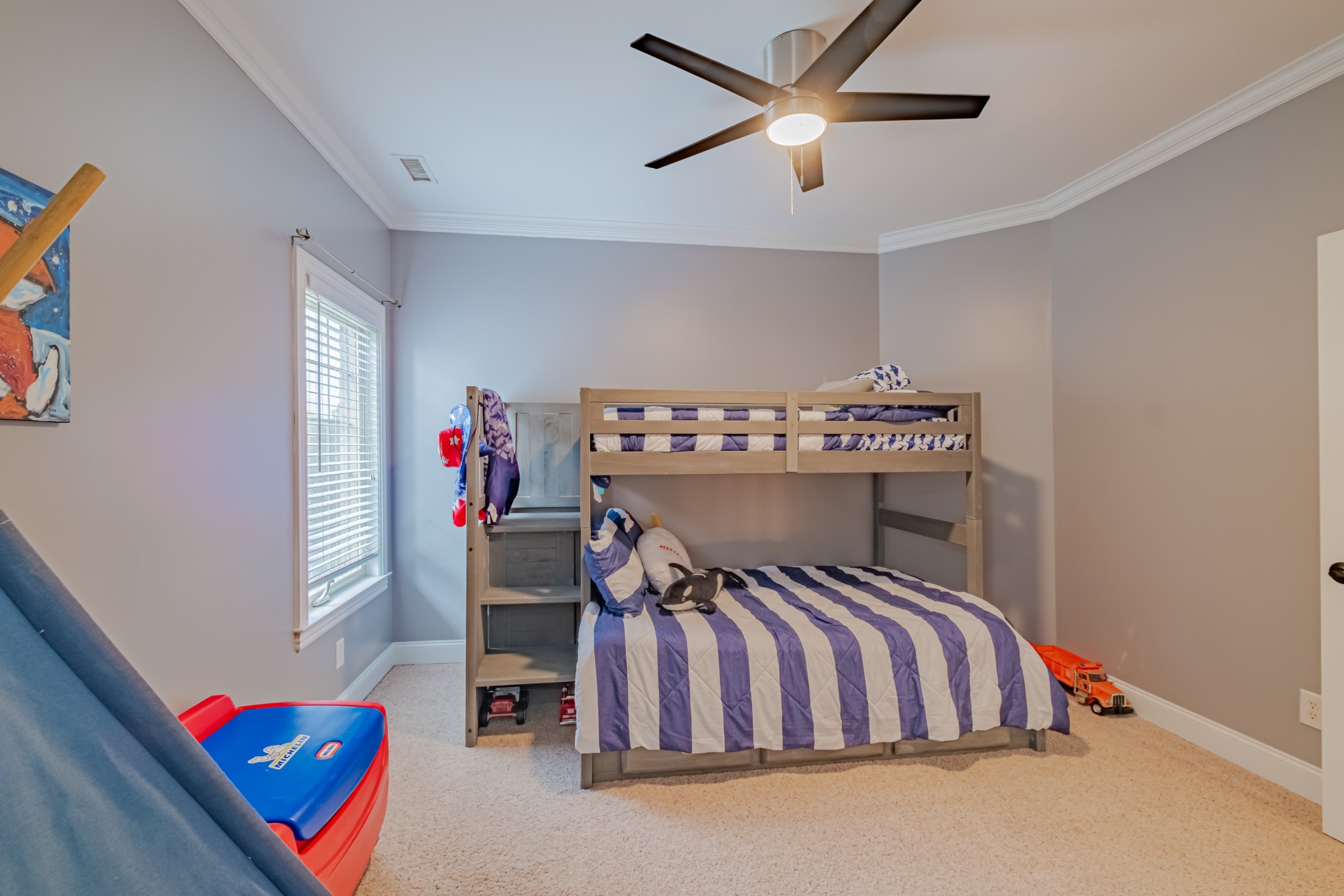 356 Ridgecrest Drive Winchester, TN 37398 - Photo 45 of 74 a bedroom with a bed and a chandelier