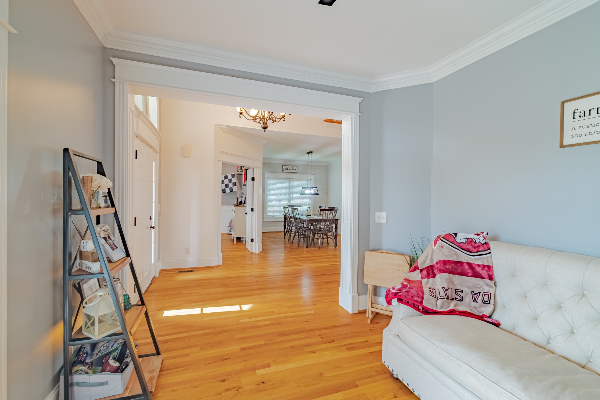 356 Ridgecrest Drive Winchester, TN 37398 - Photo 5 of 74 a hallway with a couch and chandelier