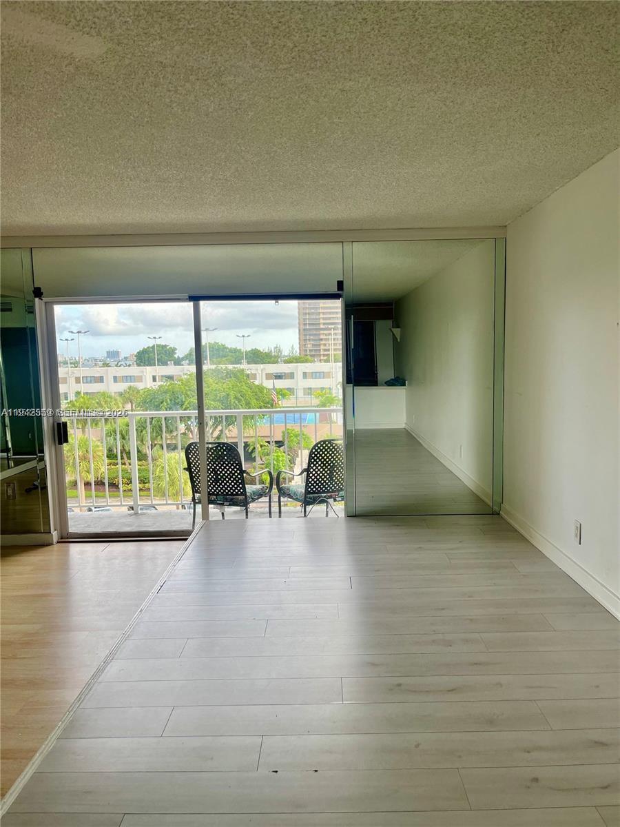 1650 Northeast 115th Street, Unit 507 Miami, FL 33181 - Photo 3 of 12 a view of an ocean with a floor to ceiling window and an outdoor view