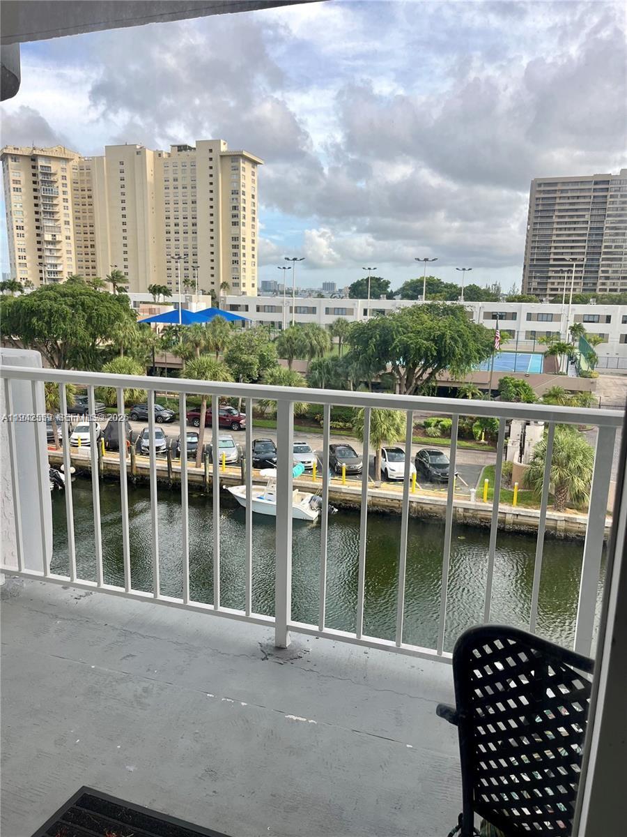 1650 Northeast 115th Street, Unit 507 Miami, FL 33181 - Photo 4 of 12 front view of a large building with a large window