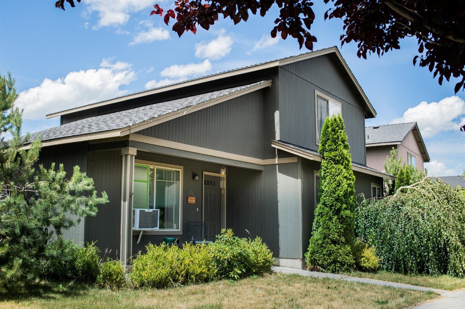 63287 Vogt Road Bend, OR 97701 - Photo 3 of 16 front view of a house with potted plants