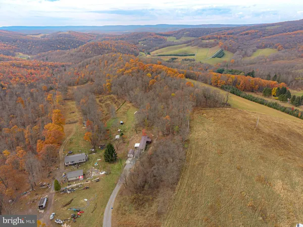 a view of a city with mountains in the background