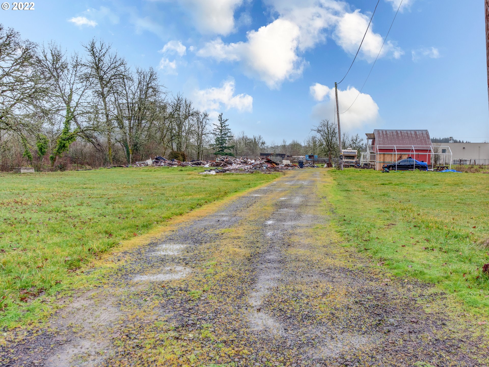 34014 West Peebles Road Eugene, OR 97405 - Photo 15 of 19 a view of a house with a yard
