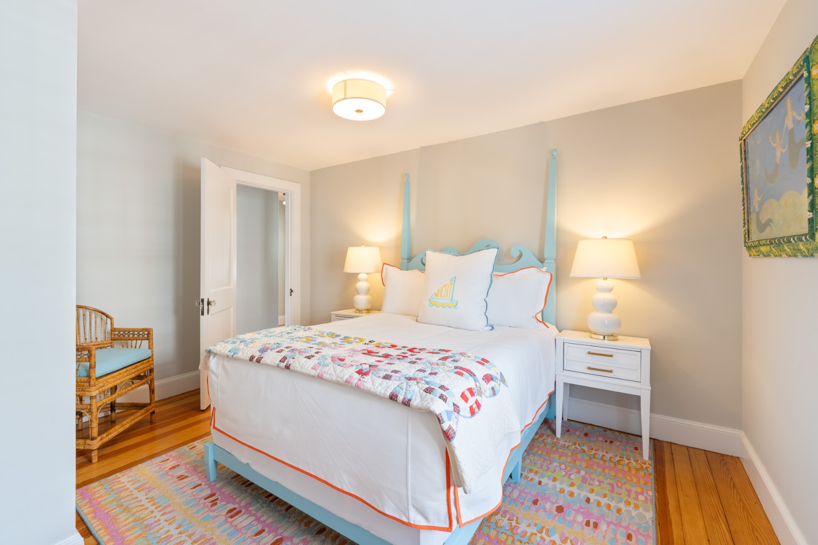 2 Silver Street Nantucket, MA 02554 - Photo 16 of 30 a bedroom with a bed and a lamp on the dresser