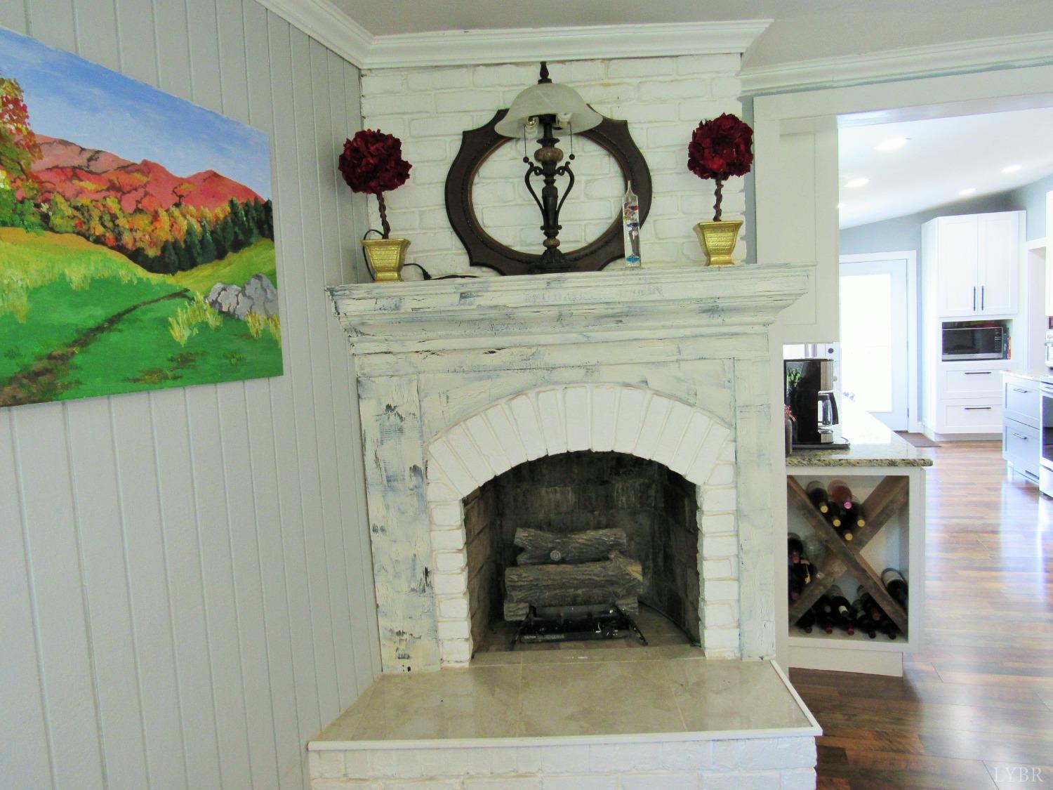 241 Hanger Road Amherst, VA 24521 - Photo 13 of 51 a living room with furniture and a fireplace