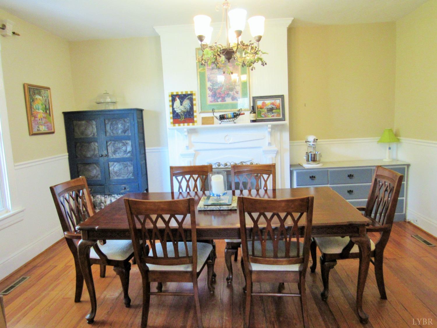 241 Hanger Road Amherst, VA 24521 - Photo 7 of 51 a view of a dining room with furniture and wooden floor