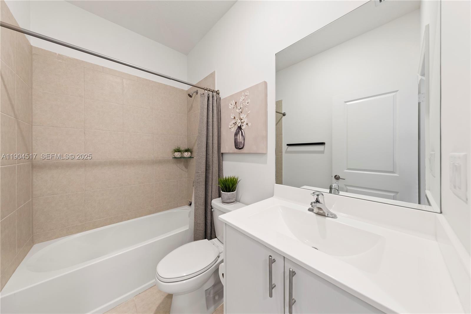 12942 Southwest 232nd Terrace Homestead, FL 33032 - Photo 14 of 27 a bathroom with a sink toilet and shower